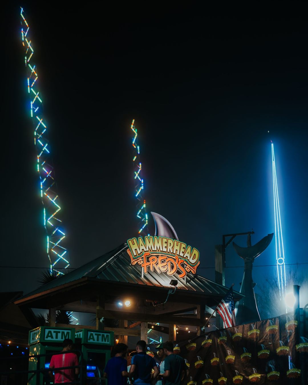 The Hammerhead Fred's neon sign at night in Panama City Beach