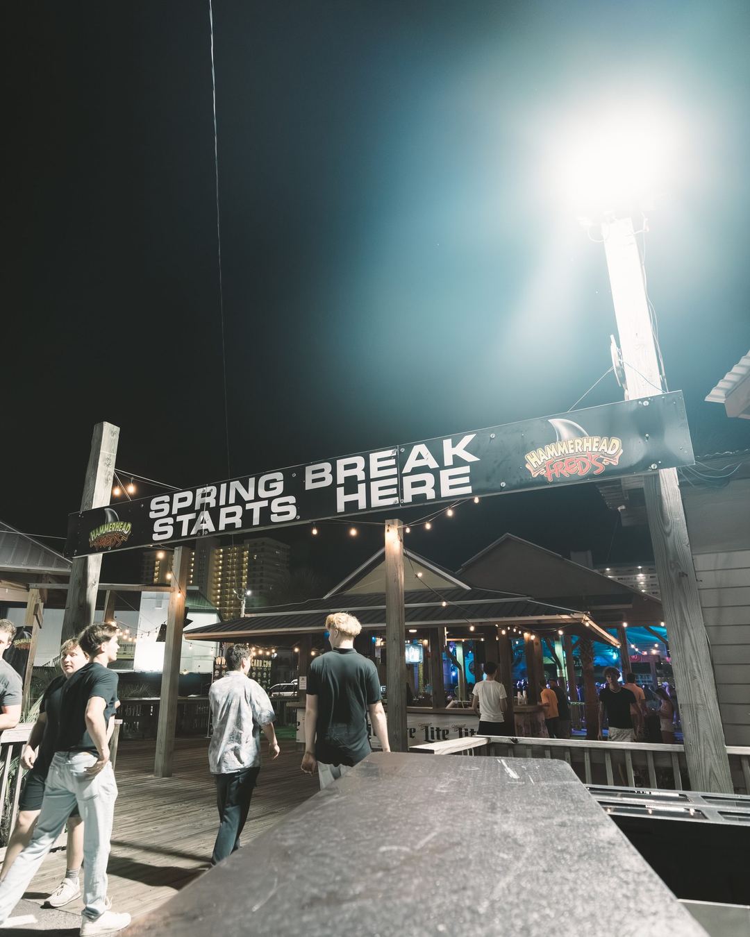 The "Spring Break Starts Here" entrance at Hammerhead Fred's at night