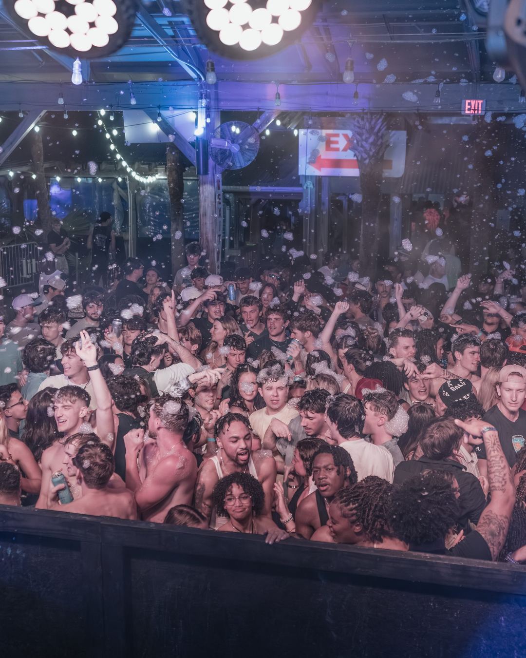 A crowd packed in front of the stage at a Panama City Beach spring break party