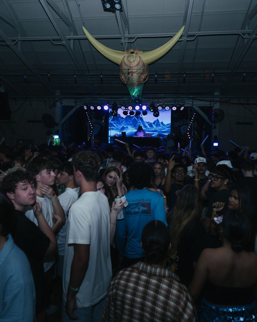 An open-air club stage under a bull-skull decoration in Panama City Beach